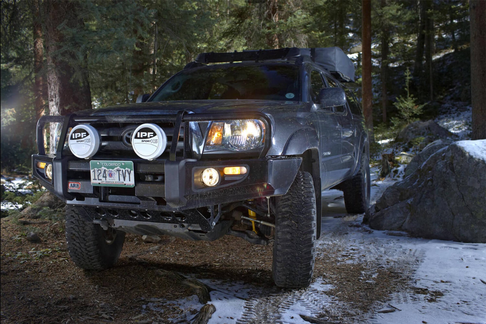 ARB 3423130 Toyota Tacoma 2005-2011 Deluxe Front Bumper Winch Ready with Grille Guard, Black Powder Coat Finish - BumperStock