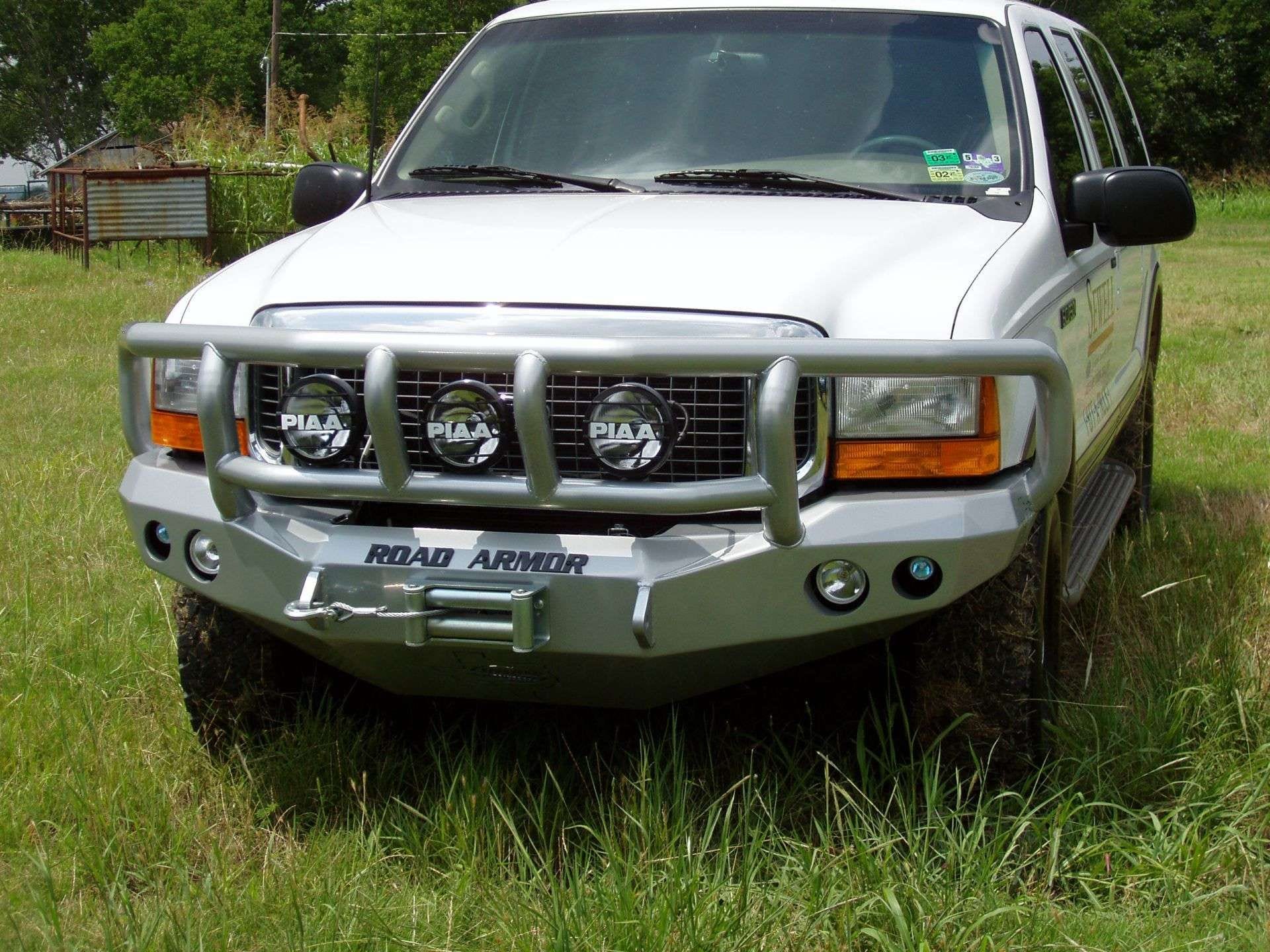 Road Armor Stealth 60502B 2005-2007 Ford F250/F350/F450/Excursion Winch Front Bumper with Titan II Guard and Round Light Cutouts - BumperStock